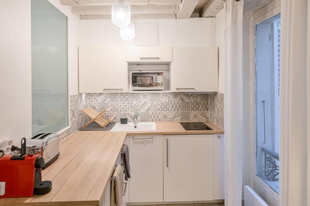 Cosy Appartement En Plein Marais パリ エクステリア 写真